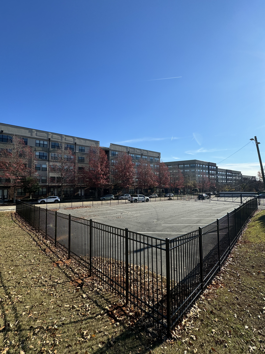 Commercial chain link fence installation at a Raleigh business property